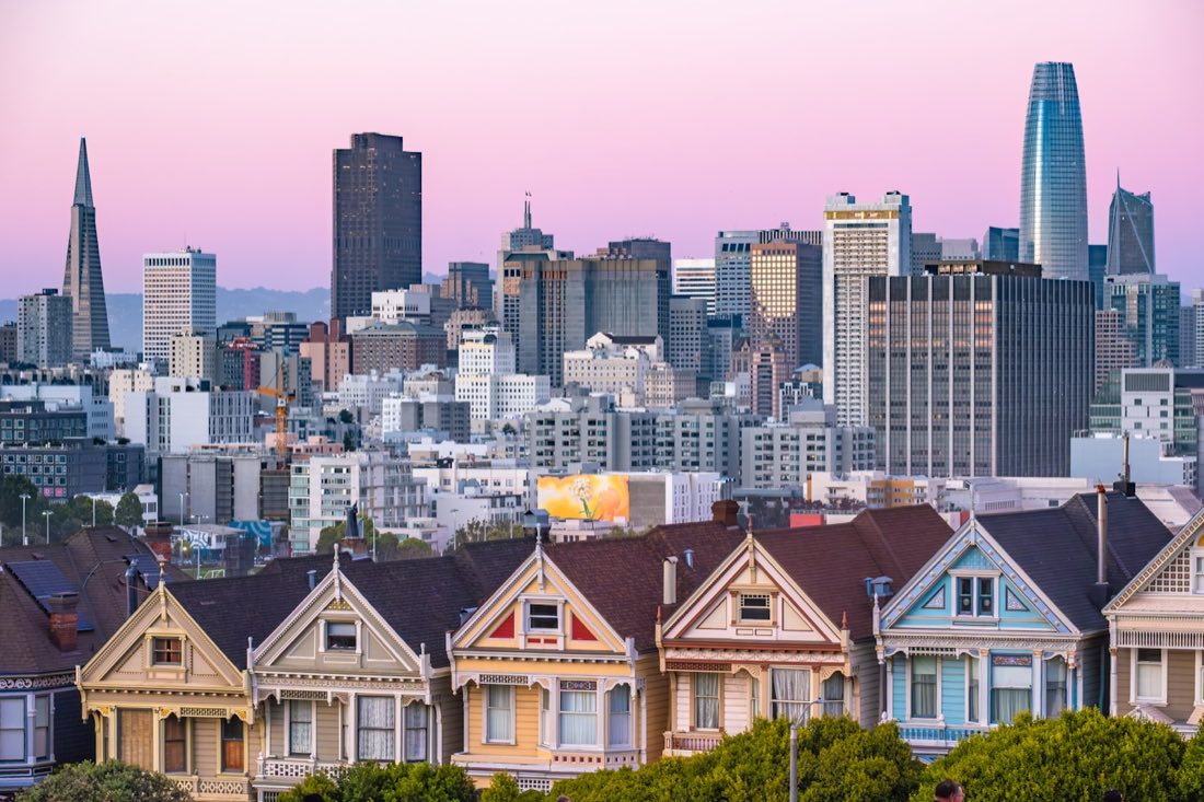 San Francisco's Painted Ladies homes against the city skyline